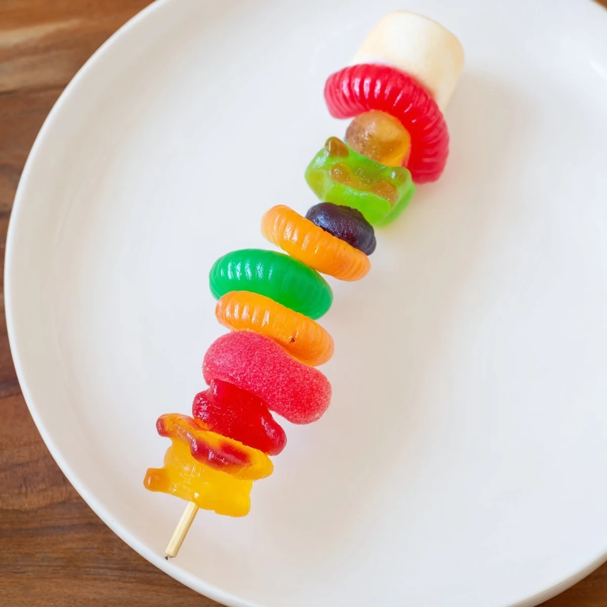 Bright and playful, these Gummy Candy Kabobs show off various textures and flavors on a skewer.