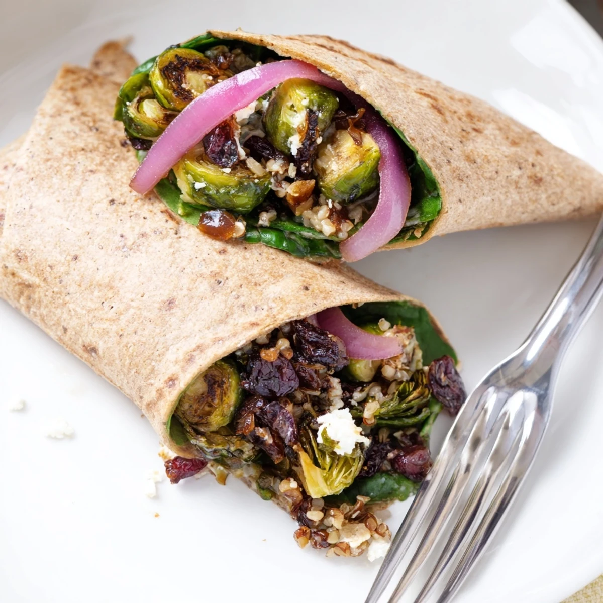 Golden-brown Roasted Brussels Sprouts & Cranberry Grain Wrap, perfect for a flavorful vegetarian lunch.