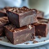 Creamy Hojicha Fudge squares with rich chocolate and roasted tea aroma on a parchment-lined tray.