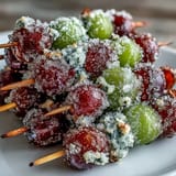 Juicy frozen grapes rolled in zesty lime sugar, perfect for cooling down on hot days or party platters.