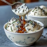 Creamy honey lavender panna cotta infused with fragrant lavender buds, topped with a golden honey drizzle.
