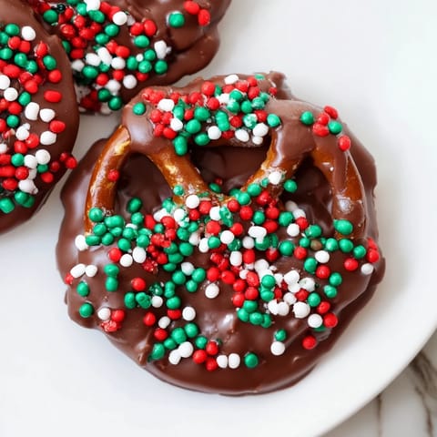 Golden, air fryer-crisped Air Fryer Christmas Pretzel Bites, ready with colorful festive toppings.