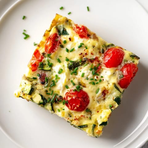 Savory High-Protein Sheet Pan Eggs With Cottage Cheese and Veggies ready for a healthy meal prep breakfast.  