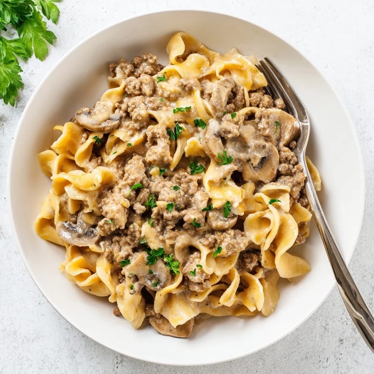 Hearty taco seasoned ground beef stroganoff with tender egg noodles and mushrooms for added texture.