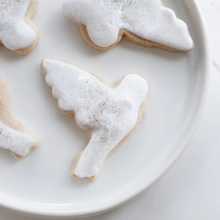 A close-up of buttery angel wings sugar cookies with colorful sprinkles, perfect for gifting this holiday.